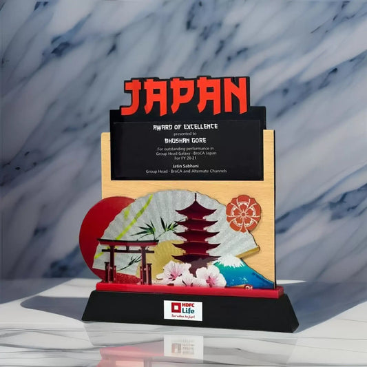 Japan themed trophy with cherry blossoms, pagoda, torii gate, and traditional fan