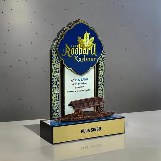 Kashmir themed trophy with traditional design in blue and gold and a shikara at the bottom
