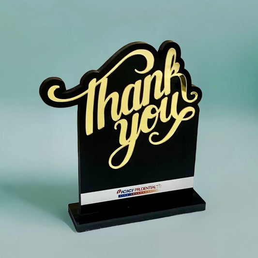 Thank you award with golden cursive writing and black background
